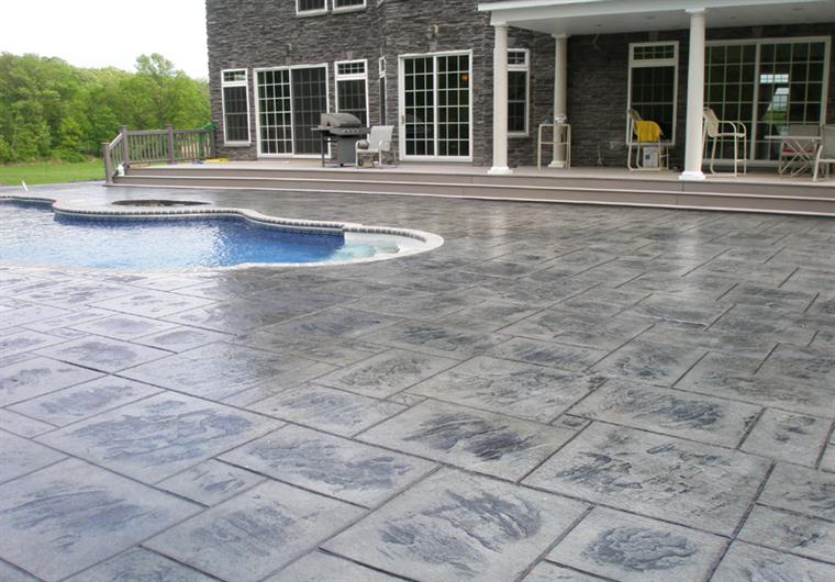 pool large stone stamped concrete